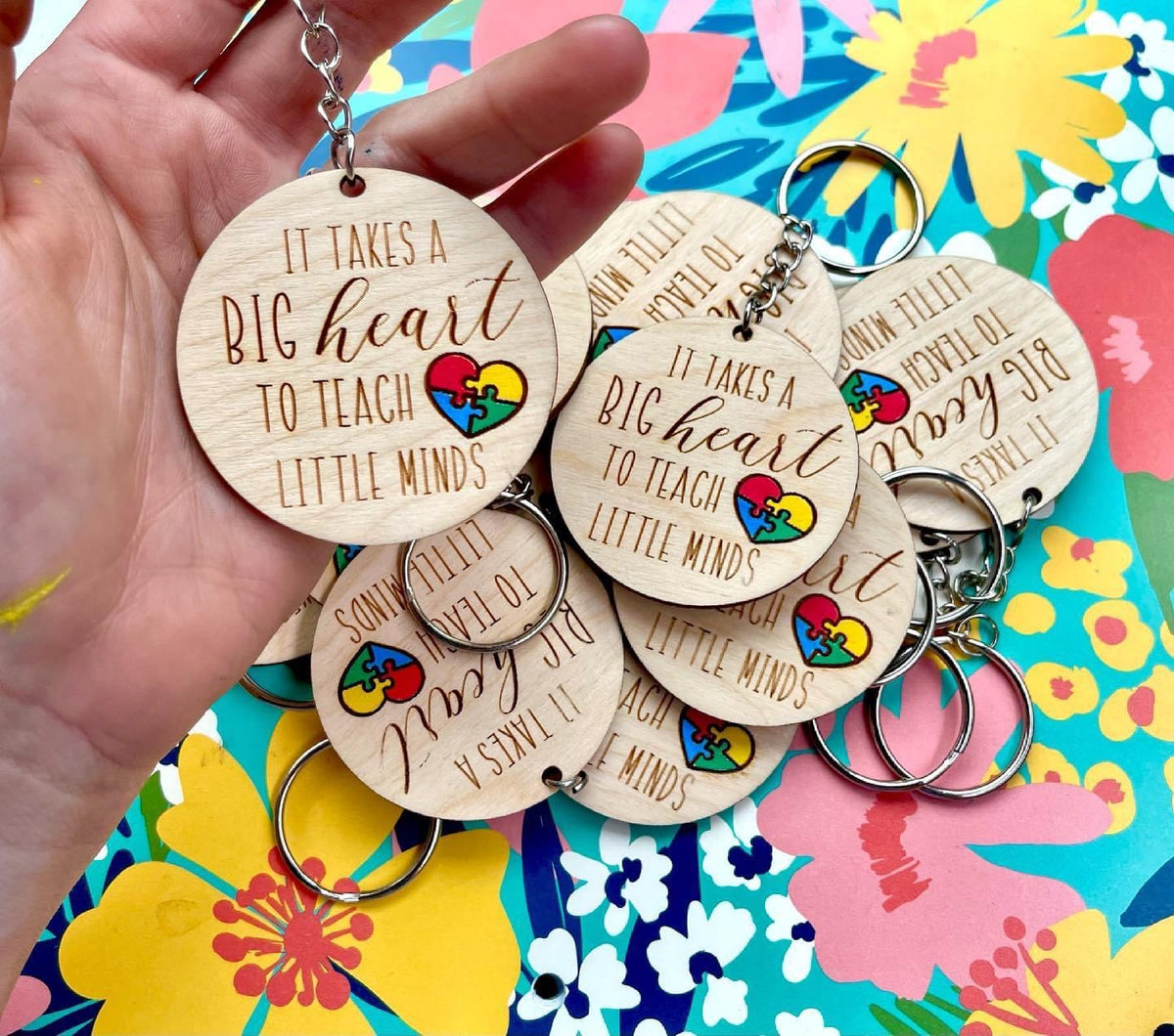 It takes a big heart to store shape little minds keychain